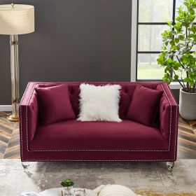 Two-seater red velvet sofa